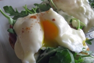 Peppery arugala compliments the mornay sauce and creamy yolks in this version of Eggs Benny.